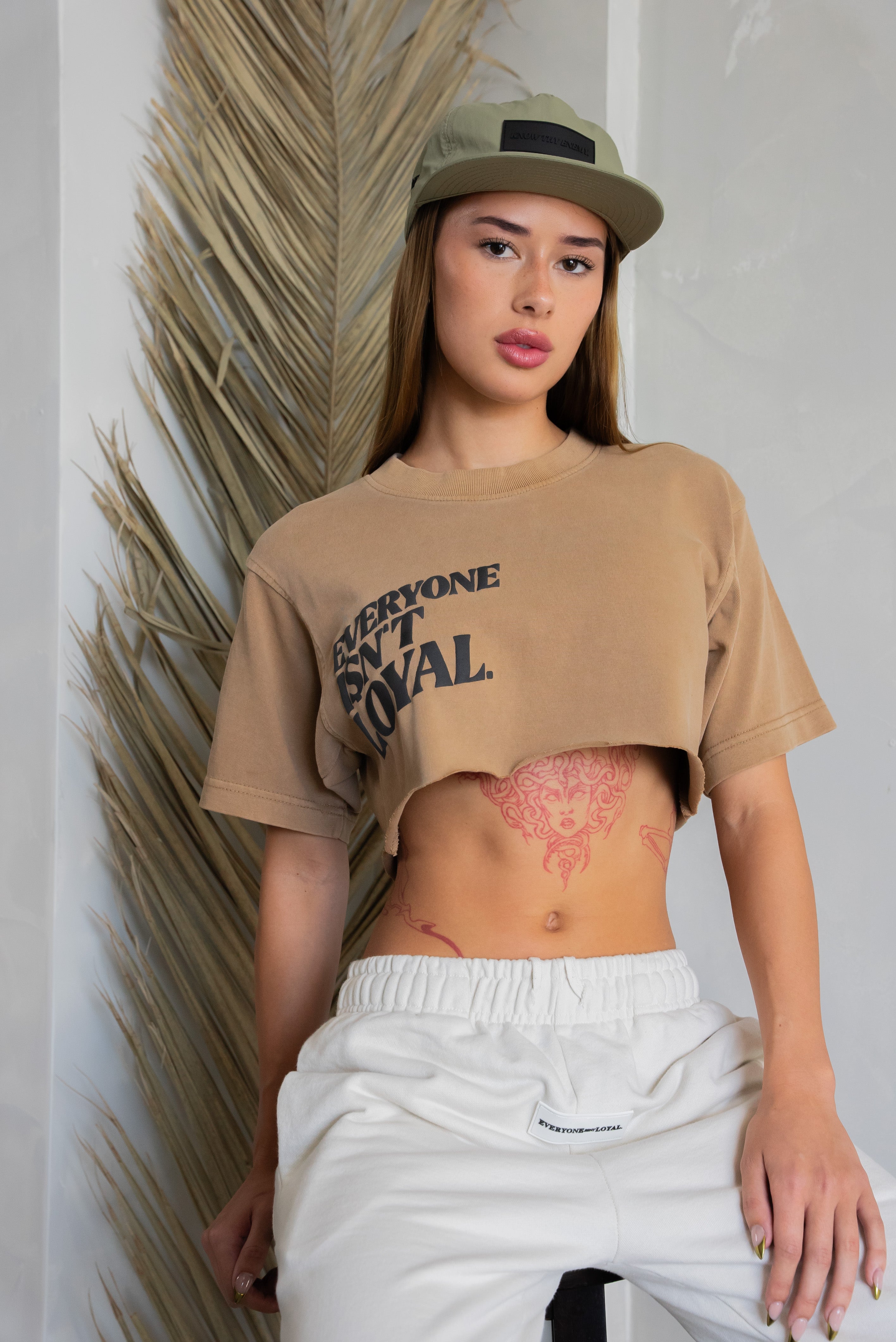 EVERYONE ISNT LOYAL SLANT CROP TEE