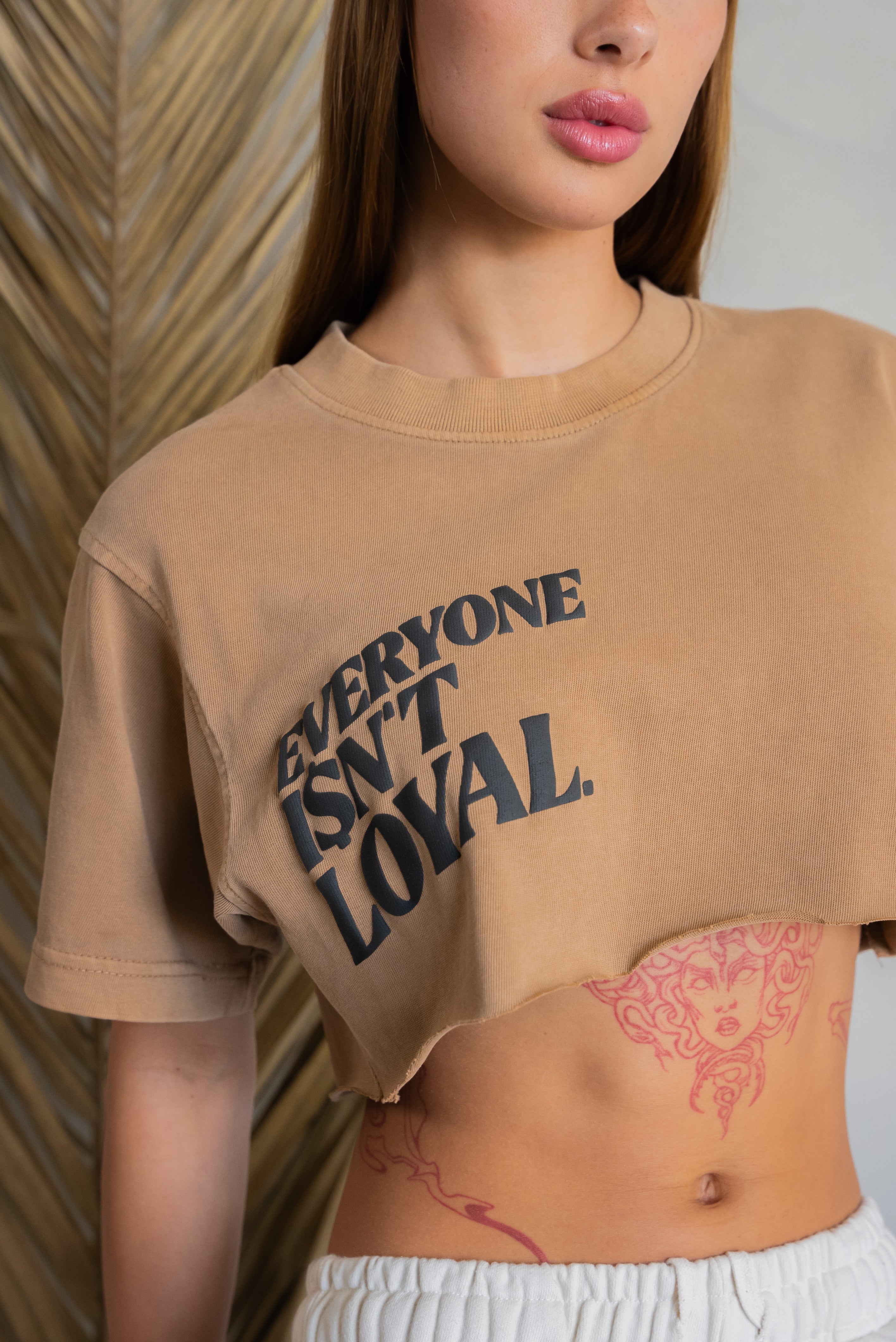 EVERYONE ISNT LOYAL SLANT CROP TEE