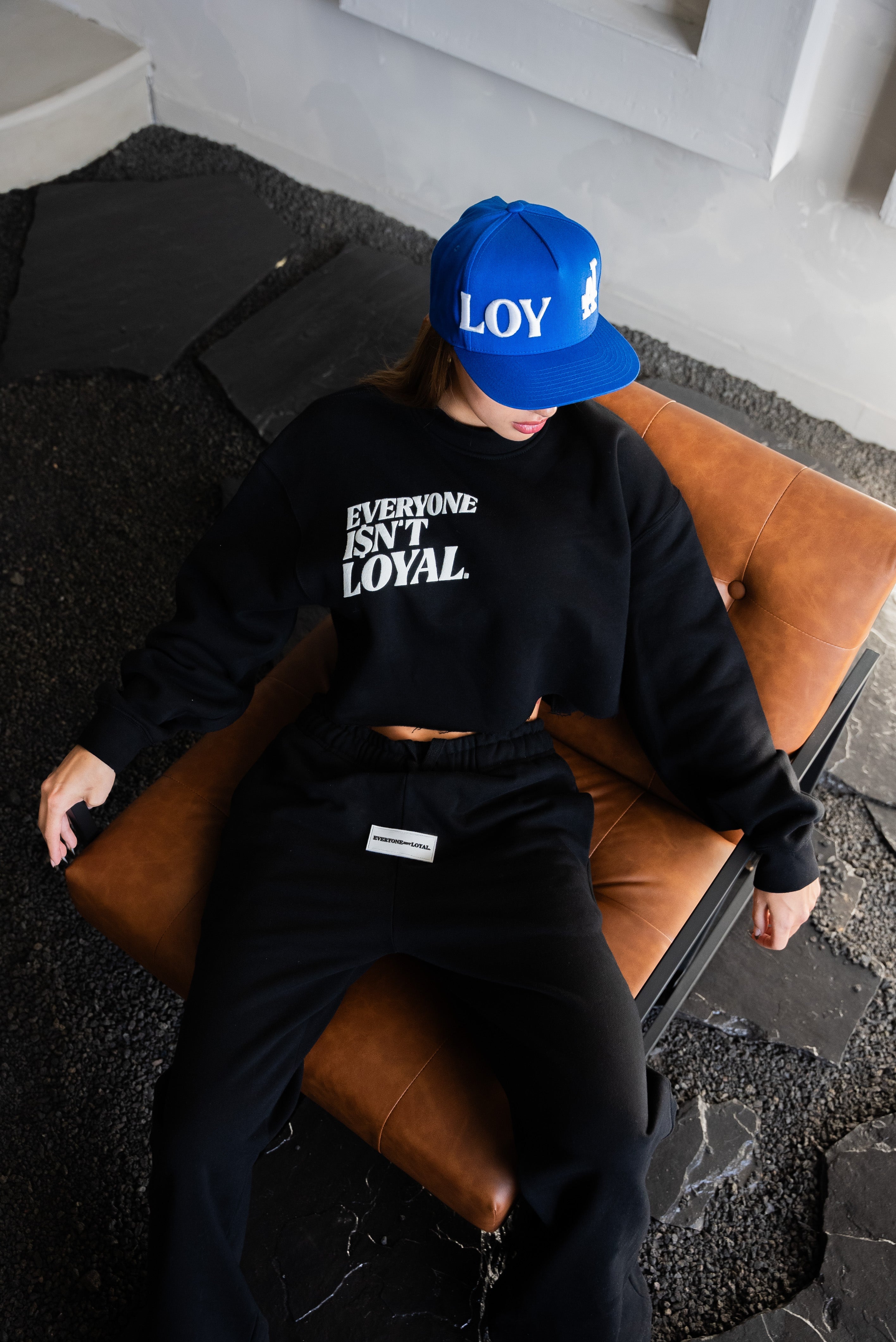 EVERYONE ISNT LOYAL SLANT CROP SWEATSHIRT